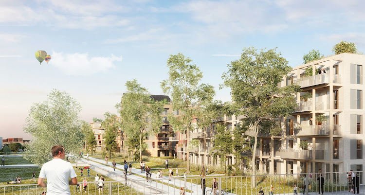 Ensemble résidentiel contemporain avec immeubles collectifs, espaces verts et cheminements doux.