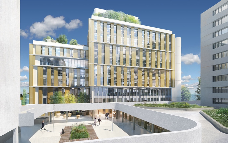 Ensemble tertiaire contemporain avec façades vitrées et espaces extérieurs paysagers.Bureaux Saint-Quentin-en-Yvelines