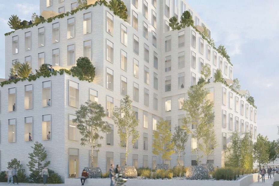 Immeuble résidentiel contemporain avec façades claires, balcons et végétation intégrée.Siège Habitat 76- logements