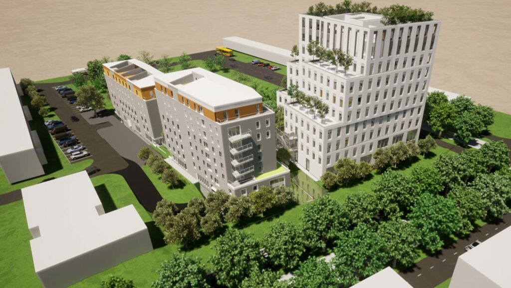 Vue aérienne d’un ensemble résidentiel contemporain avec plusieurs bâtiments et espaces verts paysagers.Siège Habitat 76- logements